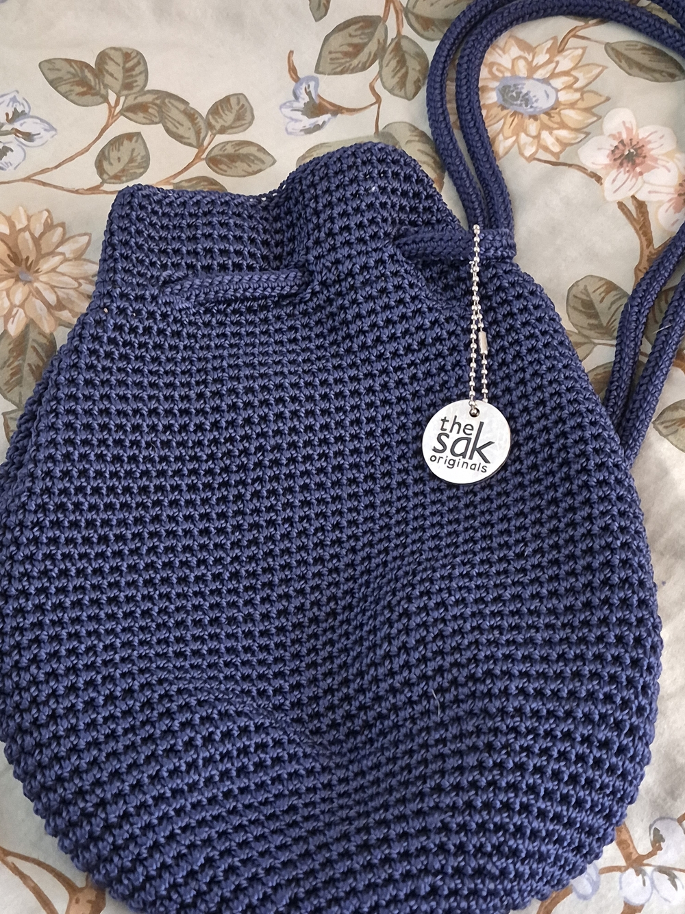 The Sak Navy Crochet Drawstring Backpack